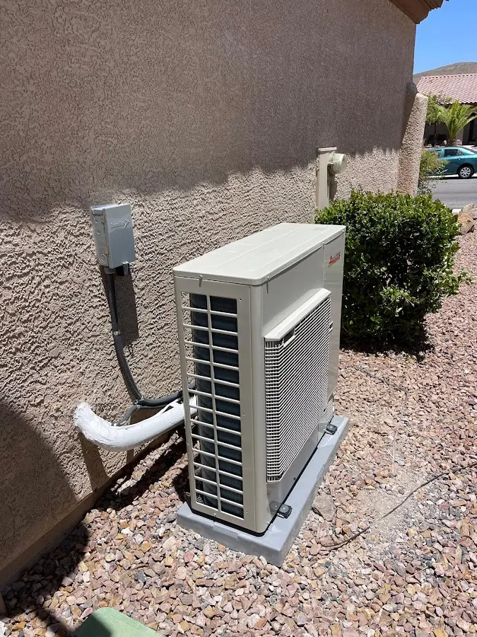 Residential air conditioning condenser unit in Seymour